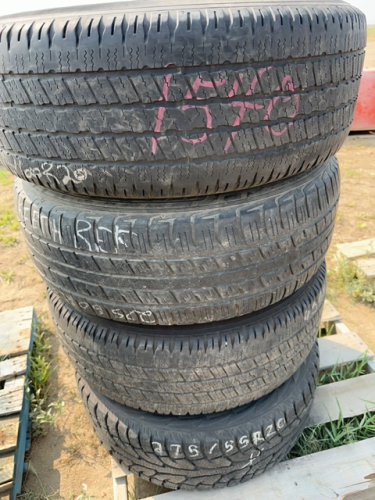 Three matching 20 inch tires on Chev rims one mismatch 20 inch tire on Chev rim