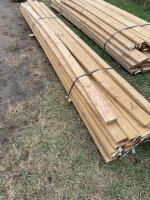 Bundle of treated two by fours