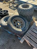 Pallet of mixed tires on rims