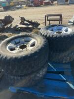 Set a four Iron Man tires on aluminum rims