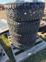 Set of four light truck tires on Ford rims
