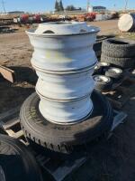 Five steel trailer rims plus one Michelin tire mounted