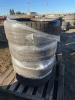 Stack of four Goodyear tires