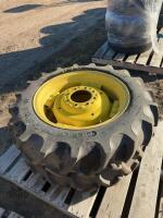 Two Goodyear tractor tires on John Deere rims