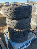 Stack of four truck tires