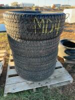 Stack of four Michelin light truck tires