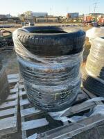 Stack of four Wrangler tires