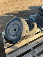 Two studded tires on five bolt rims