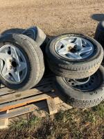 Pallet of five tires on rims