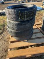 Stack of four tires