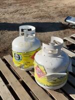 Two empty trade-in bottles