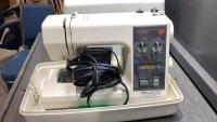 KENMORE SEWING MACHINE - HAS CORD AND FOOT PEDAL