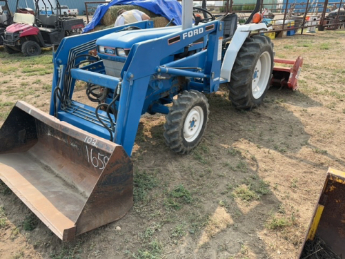 Ford 1715 Diesel Tractor front wheel assist with 7108 loader and Rototiller