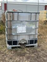 1000 L oil tote in frame