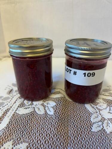 Two jars of homemade raspberry jam