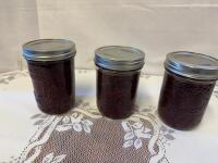 Three jars of homemade raspberry jam