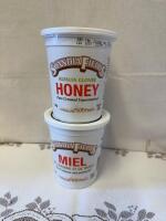 Two 1 kg tubs of Scandia, Fields, honey / unpasteurized