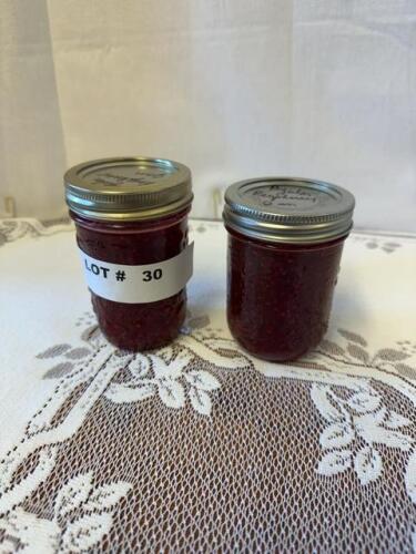 Two jars regular raspberry jam