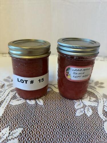 Two jars of crab apple sauce