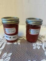 Two jars of crab apple sauce