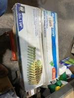 Box of inch and a quarter coil roof roofing nails
