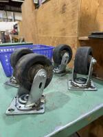 Basket of four heavy casters
