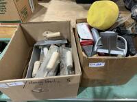 Two boxes of drywall and concrete equipment