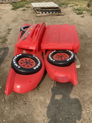 RED PLASTIC CAR BED