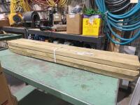 Bundle of 42 inch treated pre-cut crossmembers