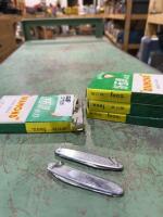 Four packages of pocket knives