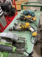 Three drills and one Skil saw