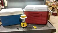 (2) COOLERS - RED AND BLUE PLUS A 12V LANTERN