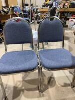 Two chrome stacking chairs