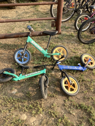 Three SMALL KIDS BIKES