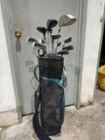Set of golf clubs in Spalding bag