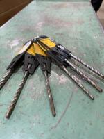 Six DeWalt concrete bits