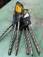 Six DeWalt concrete bits