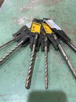 Six DeWalt concrete bits
