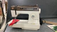 OLDER SINGER SEWING MACHINE