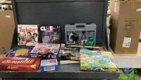 (2) BOXES W/ BOARD GAMES, PUZZLES AND A MICROSCOPE