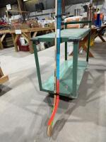 Two ball hockey sticks