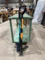 Dandelion puller, small rake and windshield scraper brush