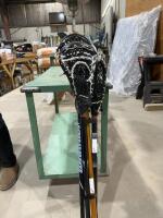 Bundle of four lacrosse sticks