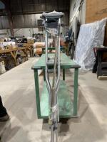 Two sets of crutches and a cane