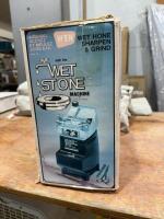 Wet stone laid sharpening machine