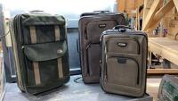 (2) LARGE SUITCASES + ONE CARRY-ON
