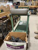 Good, tractor seat and box of plumbing parts and couplers