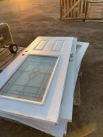 Pallet of indoor and exterior doors