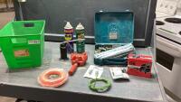 GREEN TUB W/ BRAKE PADS, WEED WHIP LINE, SPARK PLUGS, SHOP FLUIDS