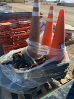 Pallet with pylon cones and cases of Harrow teeth